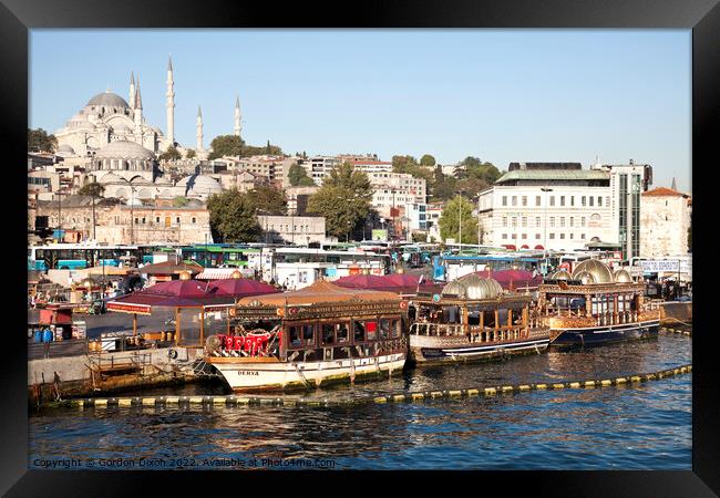 Suleymaniye Mosque and restaurant boats - Eminonu waterfront, Istanbul Framed Print by Gordon Dixon