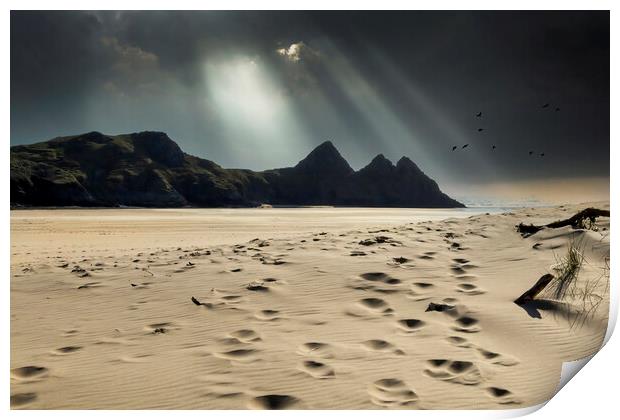 Shafts of light over Three Cliffs Bay Print by Leighton Collins