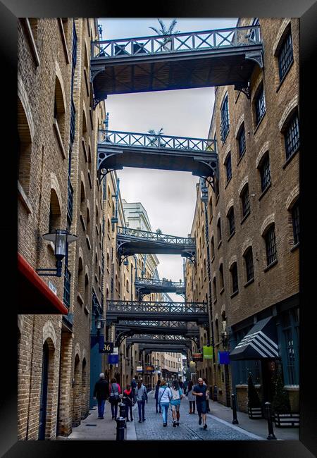 Shoppers in Shad Thames Framed Print by Joyce Storey