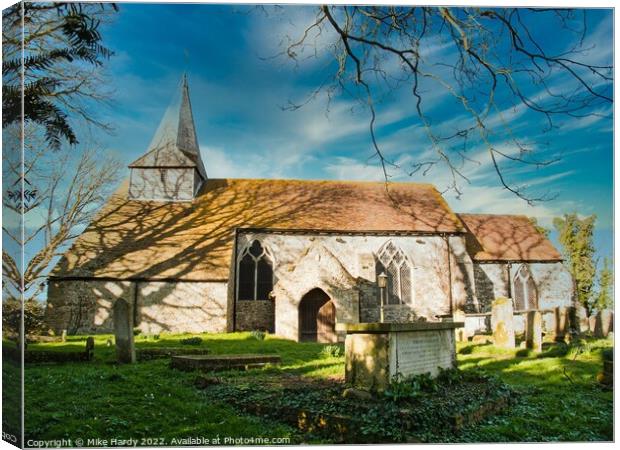 Magical Church at Brenzett on the Romney Marshes in an idyllic setting Canvas Print by Mike Hardy