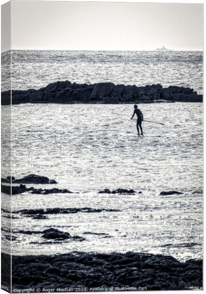 Solitude on a Silver Sea Canvas Print by Roger Mechan