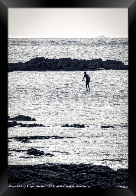 Solitude on a Silver Sea Framed Print by Roger Mechan