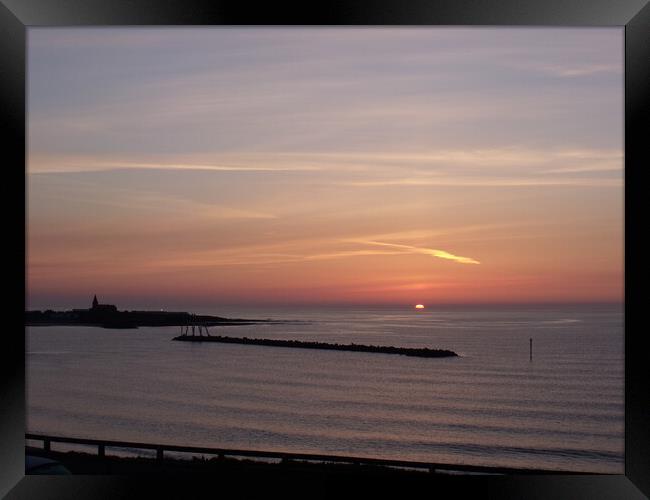 Sunrise in the bay at Newbiggin-by-the-Sea Framed Print by Richard Dixon
