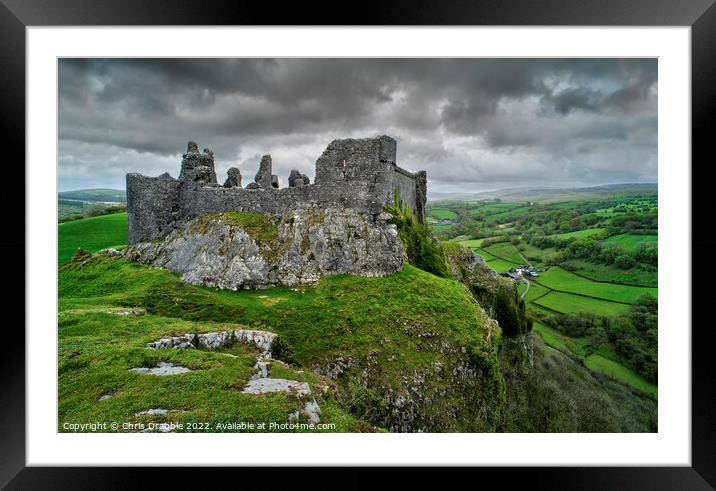 Carreg Cennen Castle with moody clouds Framed Mounted Print by Chris Drabble
