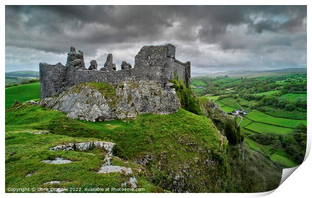 Carreg Cennen Castle with moody clouds Print by Chris Drabble