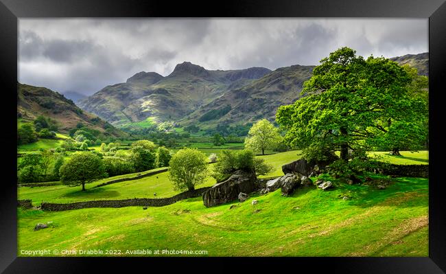 Light on the Langdale Pikes Framed Print by Chris Drabble