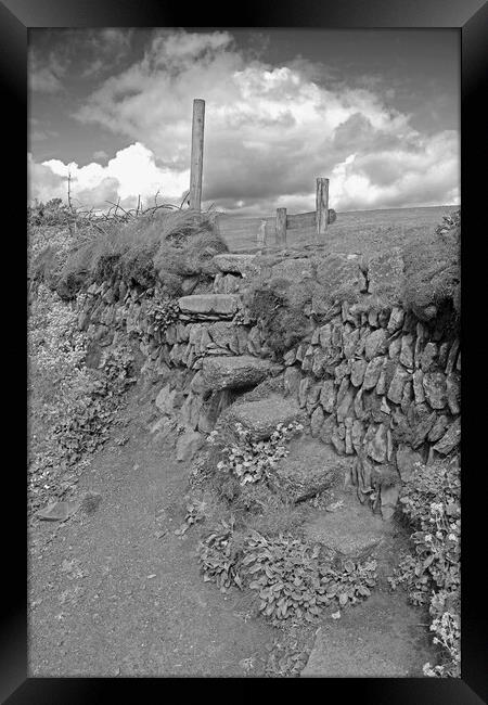 A stile over a dry stone wall Framed Print by Michael Hopes