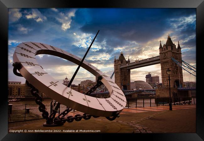 Sundial with tower bridge  Framed Print by Ann Biddlecombe