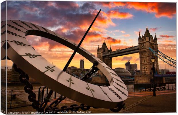 Sundial with tower bridge sunset skys in London Canvas Print by Ann Biddlecombe