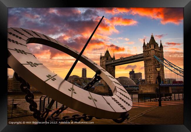 Sundial with tower bridge sunset skys in London Framed Print by Ann Biddlecombe
