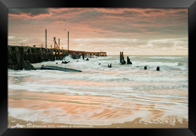 Surreal Sunrise on Walberswick Pier Framed Print by Terry Newman