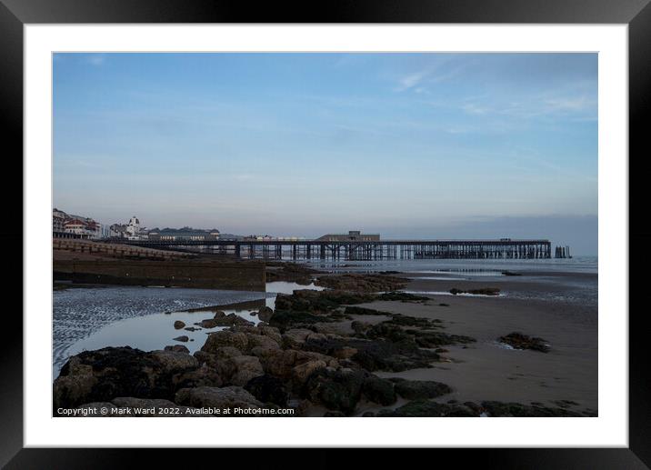Hastings Pier at Low Tide. Framed Mounted Print by Mark Ward