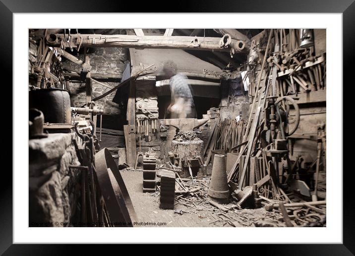 Old blacksmith's shop - with ghost-like figure  Framed Mounted Print by Gordon Dixon