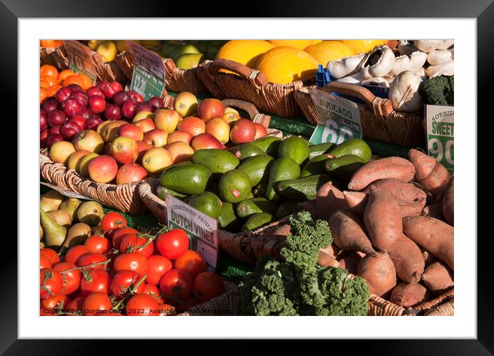 Bright colourful selection of 12 fresh fruit and vegetables on market stall Framed Mounted Print by Gordon Dixon