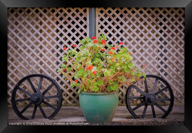 Flower Pot and Two Cart Wheels Framed Print by Errol D'Souza