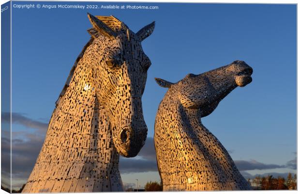 The Kelpies at golden hour Canvas Print by Angus McComiskey