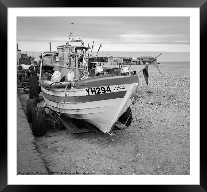 Traditional fishing boat on Cromer beach in black and white Framed Mounted Print by Chris Yaxley