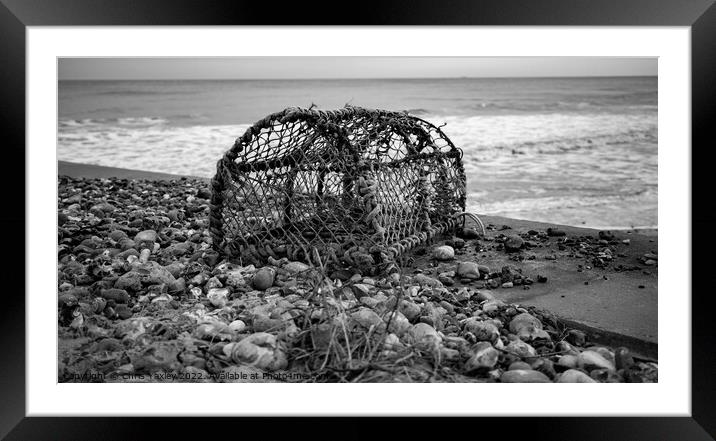 Abandoned lobster pot on the beach in black and white Framed Mounted Print by Chris Yaxley