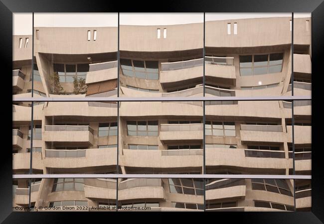Odd reflection of apartment building - Optical Delusion, Dubai Framed Print by Gordon Dixon