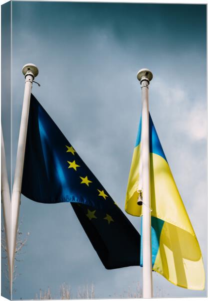 Flags of the European Union and Ukraine flutter in the wind Canvas Print by Alexandre Rotenberg