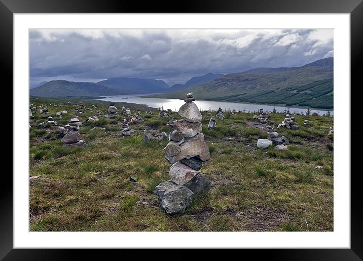 Odd cairns beside the A87 Framed Mounted Print by Gary Eason