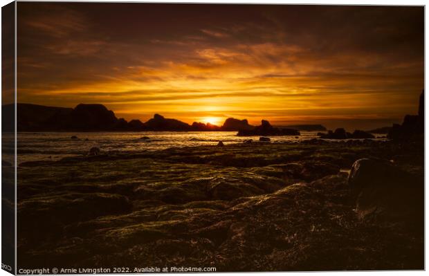 Majestic Sunset at Ballintoy Canvas Print by Arnie Livingston