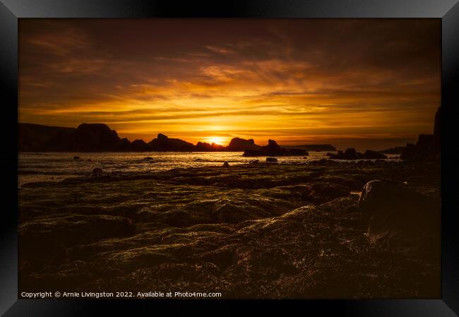 Majestic Sunset at Ballintoy Framed Print by Arnie Livingston