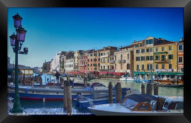 Moored on a Venice canal Framed Print by Angela Wallace