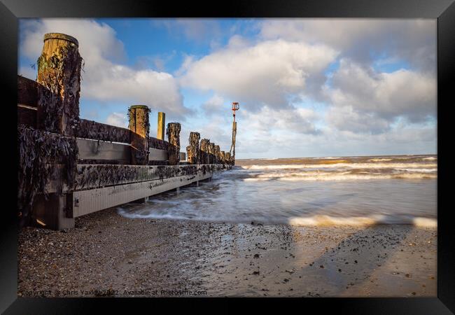 Long exposure of wooden breakers on Cromer beach Framed Print by Chris Yaxley