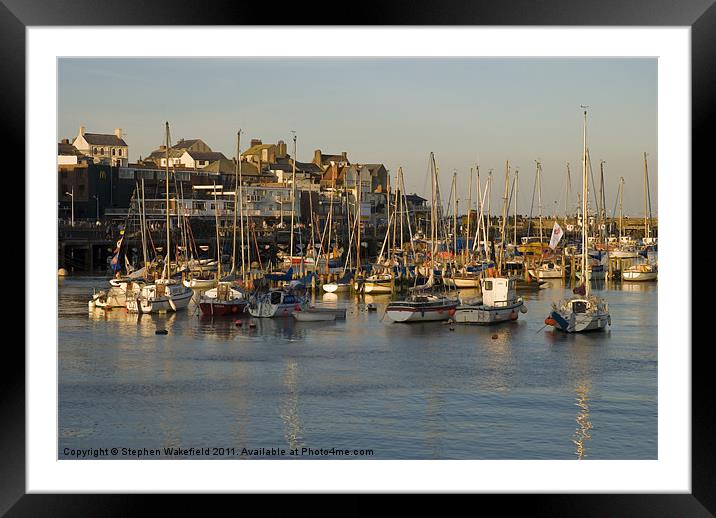 Bridlington Harbour in evening light Framed Mounted Print by Stephen Wakefield