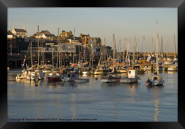 Bridlington Harbour in evening light Framed Print by Stephen Wakefield