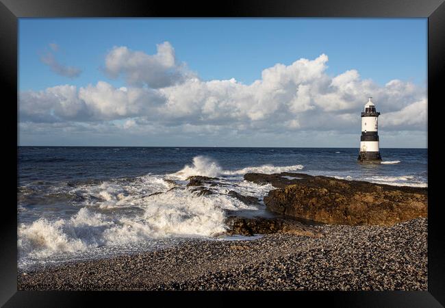 Lighthouse at penmon point Framed Print by Mike Hughes