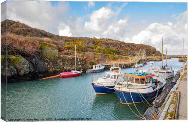 Working boats of Amwlch Harbour. Canvas Print by Mike Hughes