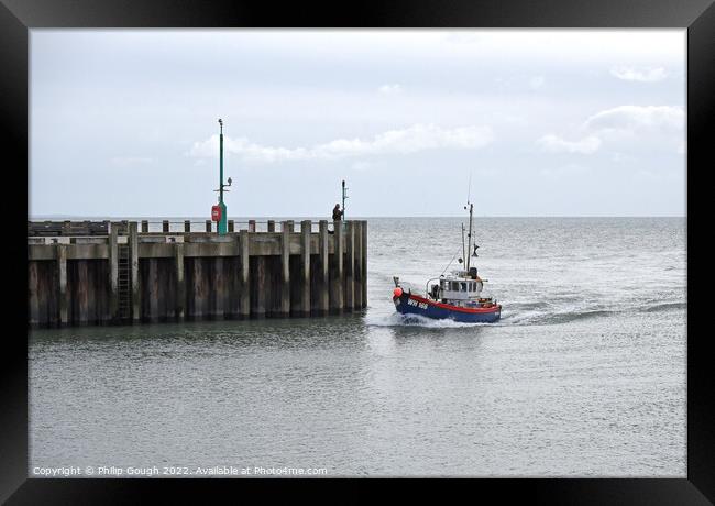 Fishing Boat in West Bay Dorset. Framed Print by Philip Gough