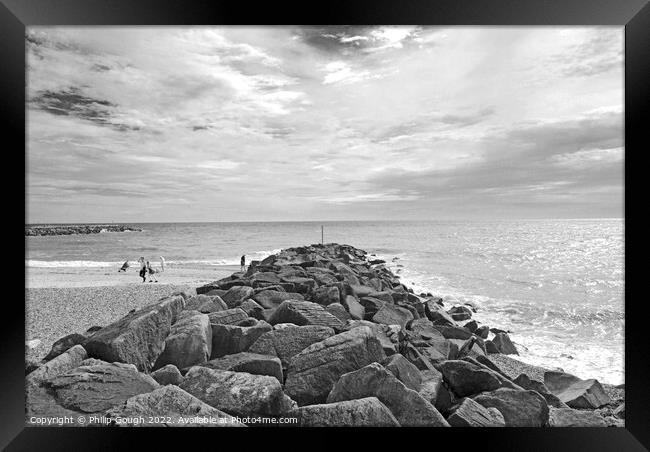 ROCKS ON THE SHORE Framed Print by Philip Gough