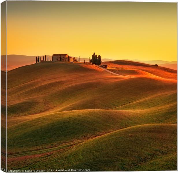 Tuscany, Rolling hills and countryside farm at sunset Canvas Print by Stefano Orazzini