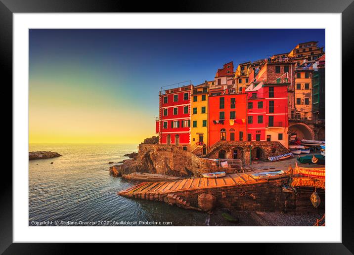 Riomaggiore town, cape and sea at sunset. Cinque Terre, Liguria, Framed Mounted Print by Stefano Orazzini