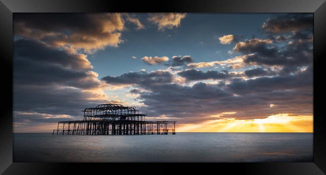 Brighton West Pier, Sunburst Framed Print by Mark Jones