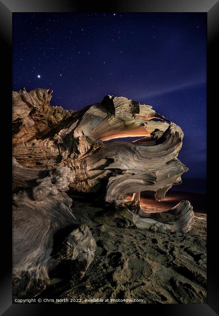 Driftwood by Starlight. Framed Print by Chris North