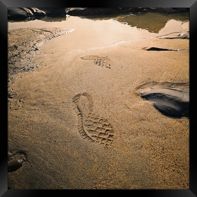 Footprints in the sand Framed Print by Michael Hopes