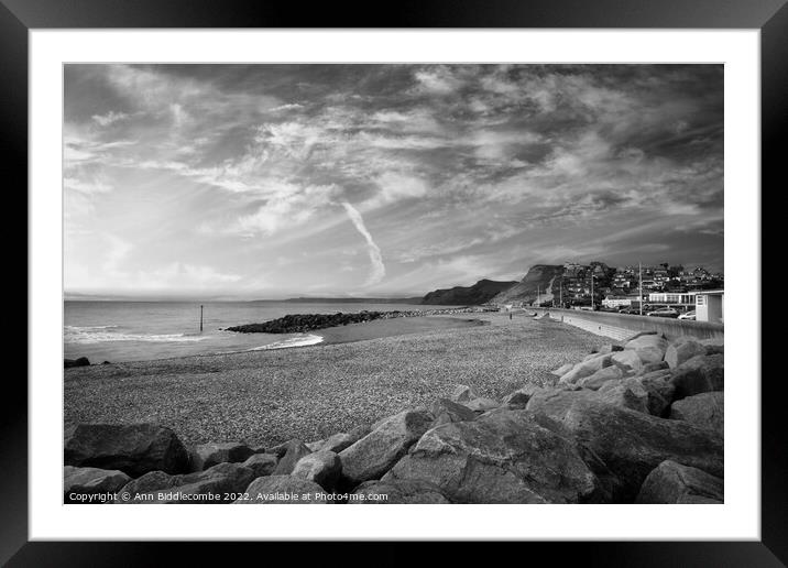 Black and white West bay beach looking towards the cliffs Framed Mounted Print by Ann Biddlecombe