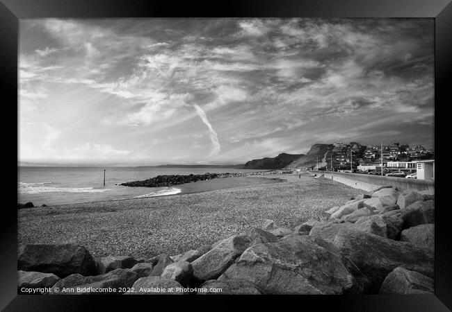 Black and white West bay beach looking towards the cliffs Framed Print by Ann Biddlecombe