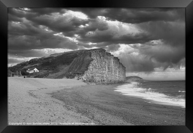 Black and white West bay beach and cliffs Framed Print by Ann Biddlecombe