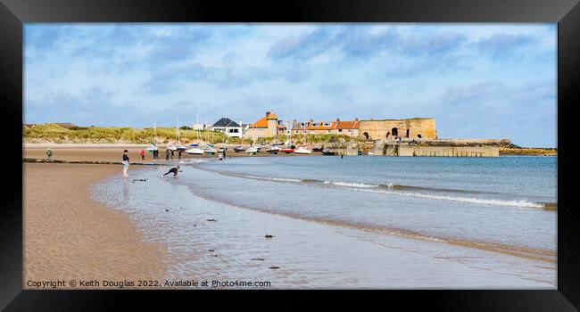 Beadnell Bay and Beadnell Village Framed Print by Keith Douglas