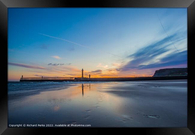 Aeroplane Trails over Whitby Beach Framed Print by Richard Perks