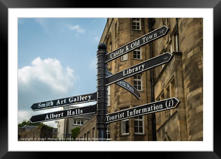 Sign post highlighting the directions to attractions in stirling town centre Framed Mounted Print by SnapT Photography