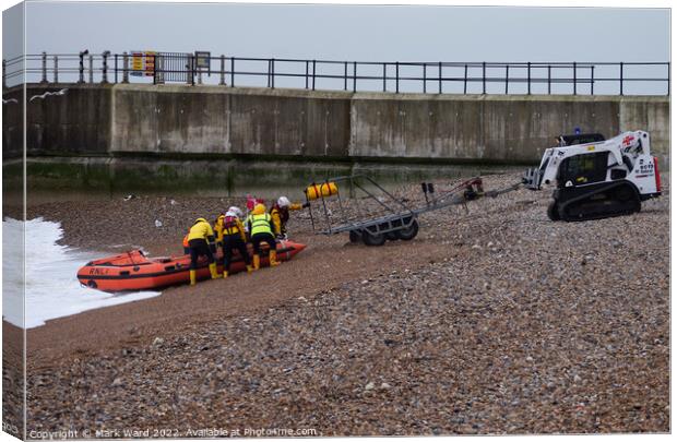 Hastings Inshore Lifeboat safely back to base.  Canvas Print by Mark Ward