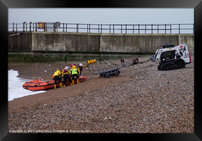 Hastings Inshore Lifeboat safely back to base.  Framed Print by Mark Ward