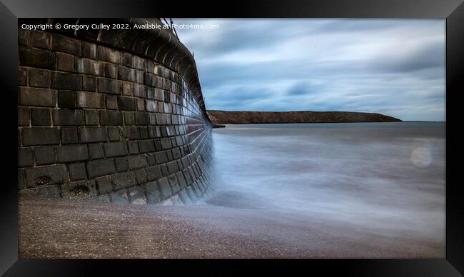 Sea wall at Filey, Brigg  Framed Print by Gregory Culley