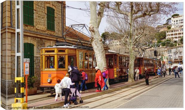 Catching The Tram At Puerto Soller Canvas Print by Peter F Hunt